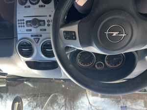 Opel Corsa D an 2009 - imagine 5