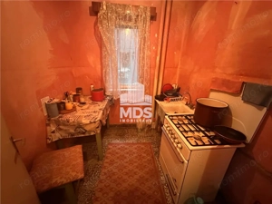 Decomandat in bloc anvelopat