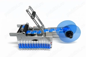 Masina de etichetat recipiente cilindrice