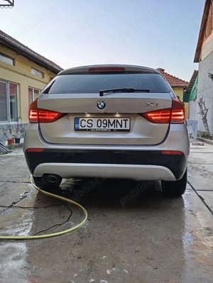 B.M.W. X1 an 2011 - imagine 3