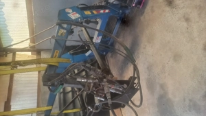 Vind brat încărcător cu cupa și furca gunoi 