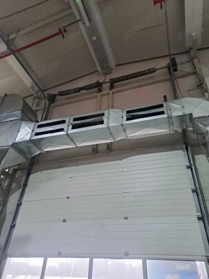 Reparatii usi garaj sectionale