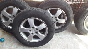 jante aliaj r16 cu cauiucuri vara stare foarte buna au fost pe un Hyundai Tucsson 