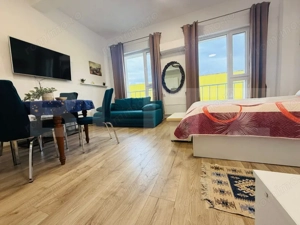 Garsonieră modernă, complet mobilată și utilată – ideală pentru investiție 