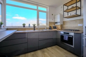 Garsonieră de închiriat, bloc 2022, etaj 10, parcare subterană inclusă - imagine 4