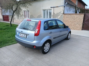 Ford fiesta an 2007 benzina 1.3 inm ro acte la zi - imagine 2