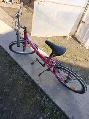 Bicicleta fete aproape noua 