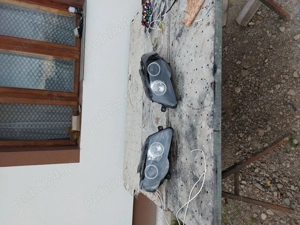 Faruri și triple Passat B6 - imagine 7