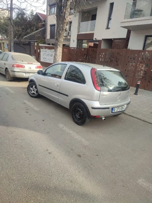 vând Opel CORSA c motor de 1 2 benzina consum mic proprietar in acte - imagine 4