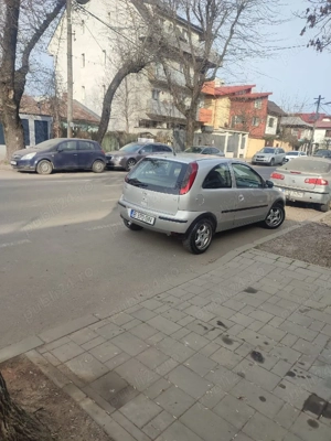 vând Opel CORSA c motor de 1 2 benzina consum mic proprietar in acte - imagine 3