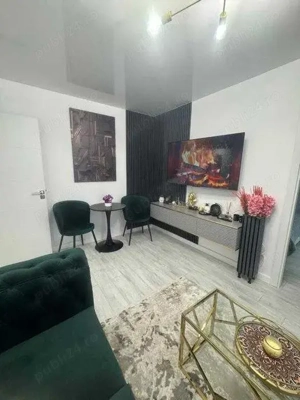 Apartament 2 camere, etajul 2, centrala gaz, zona Casa de Cultura.