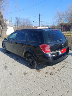 Opel Astra H station wagon 1.9 cdti an 2008 - imagine 8