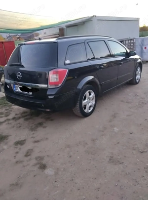 Opel Astra H station wagon 1.9 cdti an 2008 - imagine 3
