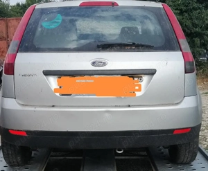 Dezmembrez Ford fiesta benzina 2005 avariat fata - imagine 3