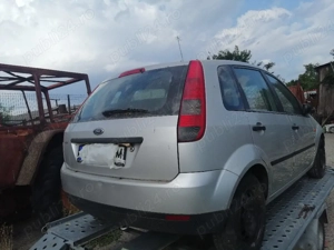 Dezmembrez Ford fiesta benzina 2005 avariat fata - imagine 2
