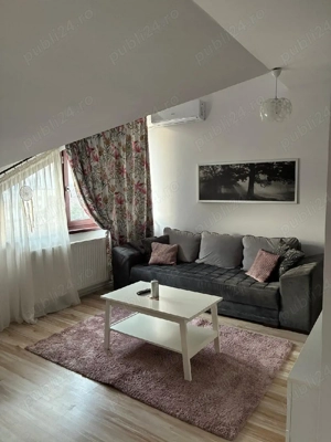 Inchiriez ap.2 camere-Modern complet mobilat si utilat-zona Tractoru- loc parcare inclus