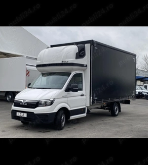 De închiriat dubă cub cu prelată pentru mutări mobilă bagaje debarasare mobilă veche materiale