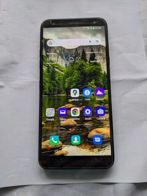 Vand Telefon lg k 40