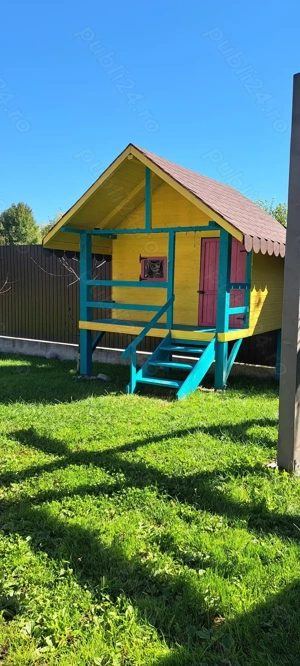  Casuta de lemn si loc de joaca copii