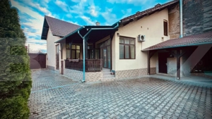 Casă Modernă - Spații generoase, teren amplu și confort ridicat