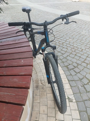 Bicicleta aproape noua