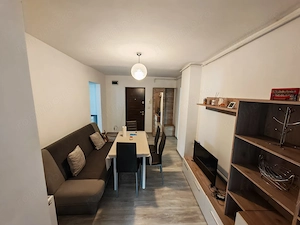 Apartament cu 2 camere,decomandat,etajul 2,zona Baba Dochia
