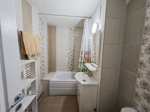 Apartament cu 2 camere,decomandat,etajul 2,zona Baba Dochia - imagine 12