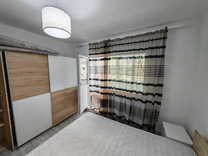 Apartament cu 2 camere,decomandat,etajul 2,zona Baba Dochia - imagine 4