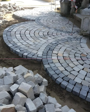 Echipa de Pavaji piatră cubică 