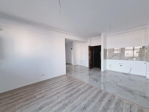 Bloc nou finalizat. 2 locuri de parcare. 73 mp utili. Etaj intermediar. 2 bai.  - imagine 2