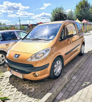 Peugeot 1007 , 1.4b , recent înmatriculat , 133000 km an 2008 . stare f.b toate dotările.
