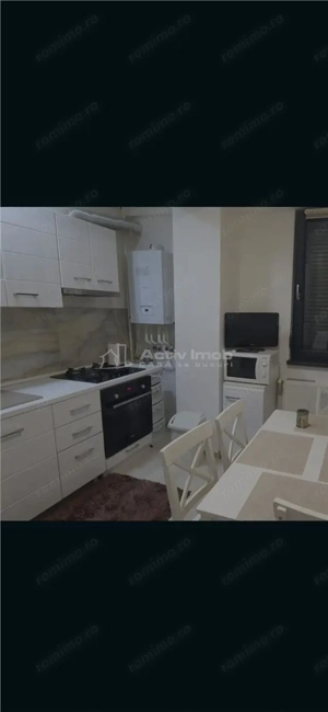 Apartament 2 camere , mobilat, utilat, parter, gradina,bloc nou - Valea Rosie - imagine 3