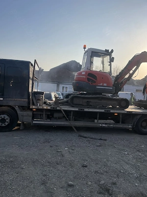 Tractez,transport autovehicule,utilaje in toata tara cu platforme auto.Platforma este in Deva.