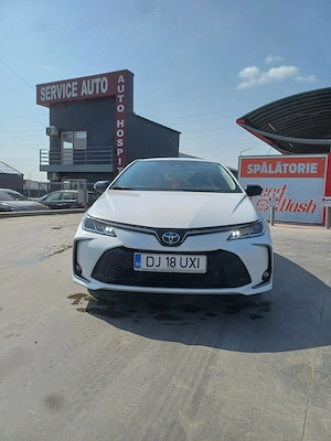 Vind sau schimb Toyota corolla 1,8 benzina -hybryd cumparata noua ,proprietar an 2025  - imagine 2