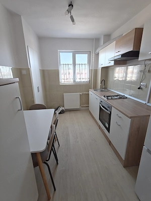 Închiriez apartament 2 camere  - imagine 2