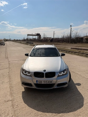 BMW E91   2006   2.0d   Automată    - imagine 2