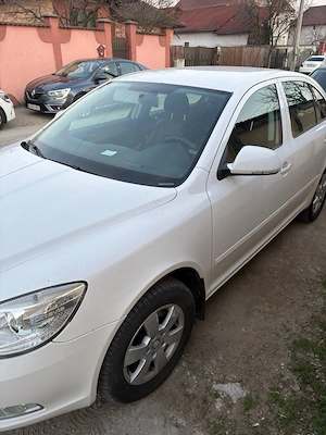 Skoda Octavia 1.6 TDI an 2011 - imagine 6
