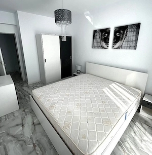  ofer chirie PL0IESTI apartament decomandat cu 2 camere - imagine 7