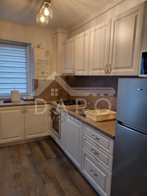 Închiriez apartament cu 2 camere  începând cu 1 februarie - imagine 2