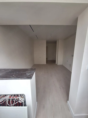 3 camere decomandate  Baia Comunala   etajul 1 - imagine 4