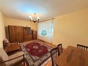 Inchiriez apartament cu 4 camere, 2 bai, etaj 1 in Dambu zona Profi - imagine 2