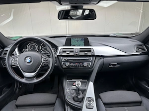 BMW Seria 3 SW 2.0 Diesel 140 CP An 2014 xDrive - imagine 13