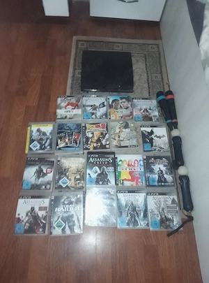 vând PS3 cu tot cu jocuri 