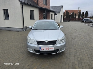 Skoda Octavia 2.0 TDI DPF Ambition - imagine 7