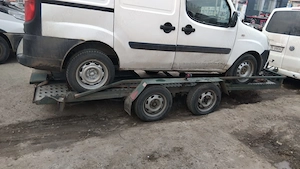 Transport auto  pe platformă 