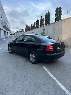 Vand Skoda octavia 2 1.6 mpi an fab 2008 prețul este negociabil  - imagine 4