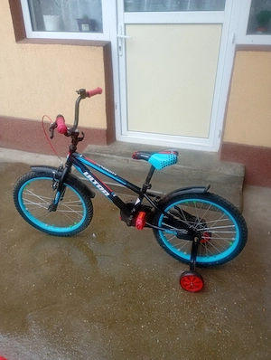 Bicicleta copil de vânzare, folosită mai deloc.