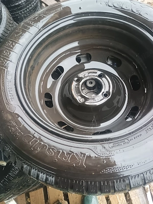 Set roți 195/65/R15 cu capace Peugeot 