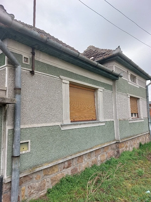 Casă de vânzare cu teren generos în Belfir