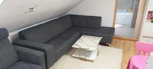 Canapea in forma de L